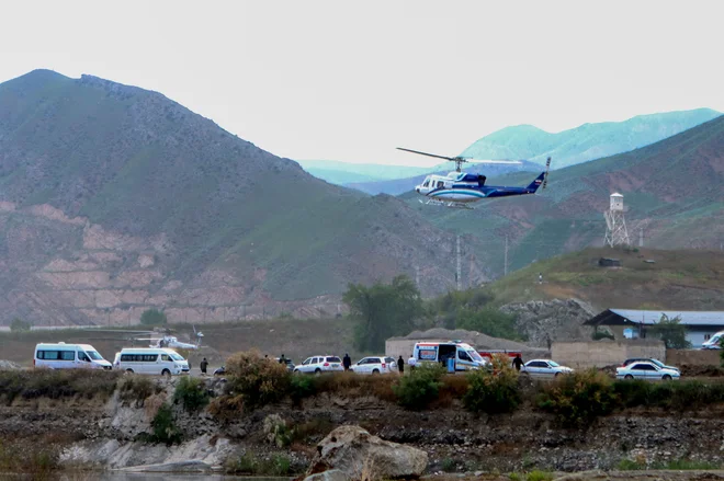 V helikopterski nesreči sta umrla iranski predsednik in zunanji minister. FOTO: Ali Hamed Haghdoust/AFP