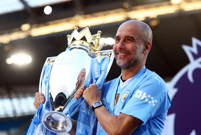 Pep Guardiola je navdušen zbiratelj trofej. FOTO: Lee Smith/Reuters