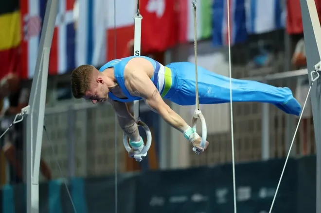 Luka Bojanc je svojo finalno vajo na krogih še otežil. FOTO: Aleš Fevžer/Facebook/Gimnastična Zveza Slovenije