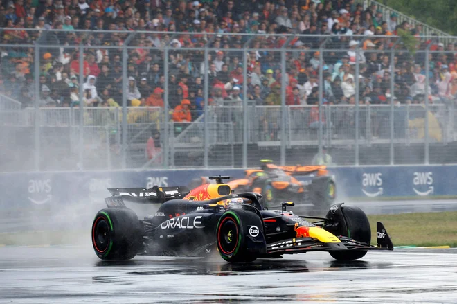 Max Verstappen je najbolje opravil s spremenljivimi razmerami v Montrealu. FOTO: Chris Graythen/AFP
