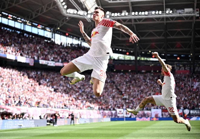 Benjamin Šeško bo po ugibanjih o njegovi prihodnosti ostal v Leipzigu. FOTO: Annegret Hilse/Reuters