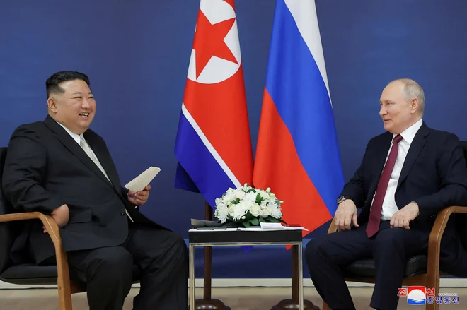 Vladimir Putin in Kim Džong Un na srečanju v Rusiji leta 2023 FOTO: KCNA via Reuters