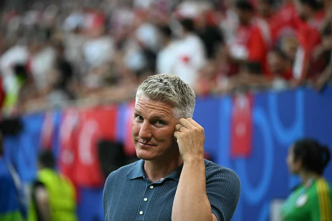 Bastian Schweinsteiger bi privoščil Slovencem napredovanje v četrtfinale evropskega prvenstva. FOTO: Gabriel Bouys/AFP