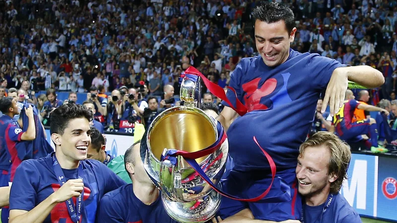 Ivan Rakitić (desno) je vrhunec kariere na klubski ravni ujel v dresu Barcelone, skatero je bil leta 2015 evropski prvak. FOTO: Kai Pfaffenbach/Reuters Pictures