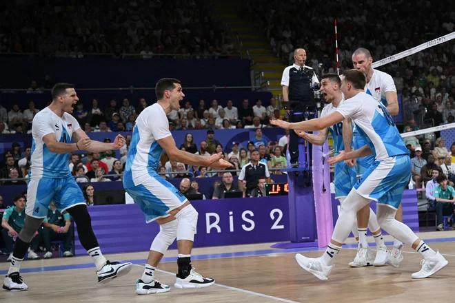 Slovenci so se razveselili prve zmage v olimpijski zgodovini. Foto Annegret Hilse/Reuters