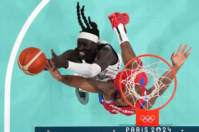 Južni Sudan je bil ob ognjenem krstu na največji športni prireditvi boljši od Portorika. FOTO: AFP