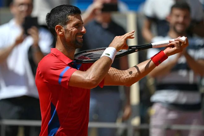 Novak Đoković želi pred koncem kariere osvojiti tudi naslov olimpijskega zmagovalca. FOTO: Patricia De Melo Moreira/AFP