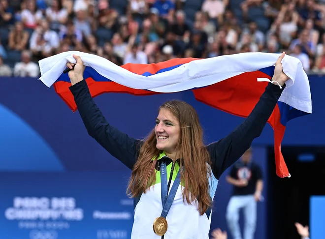 Andreja Leški je po velikem podvigu v Parizu kar žarela od silne sreče. FOTO: Annegret Hilse/Reuters