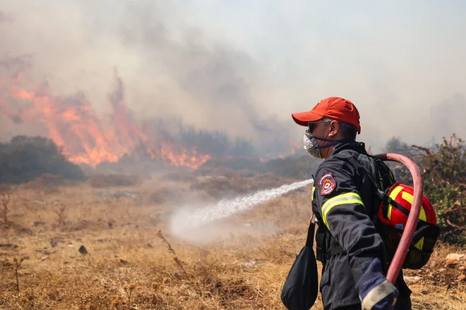 Grčija je v ponedeljek za pomoč zaprosila Evropsko unijo. FOTO: Aris Oikonomou/AFP