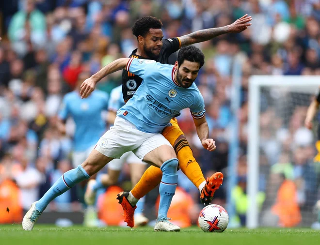 Ilkay Gündogan je spet sinje-modri. FOTO: Molly Darlington/Reuters