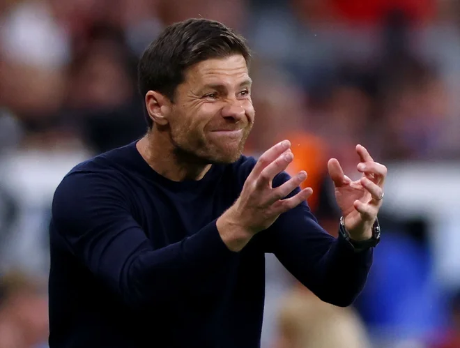 Trener Xabi Alonso je v pretekli sezoni po baskovsko uspešno selekcioniral šampionsko moštvo Bayerja iz Leverkusna. FOTO: Thilo Schmülgen/Reuters