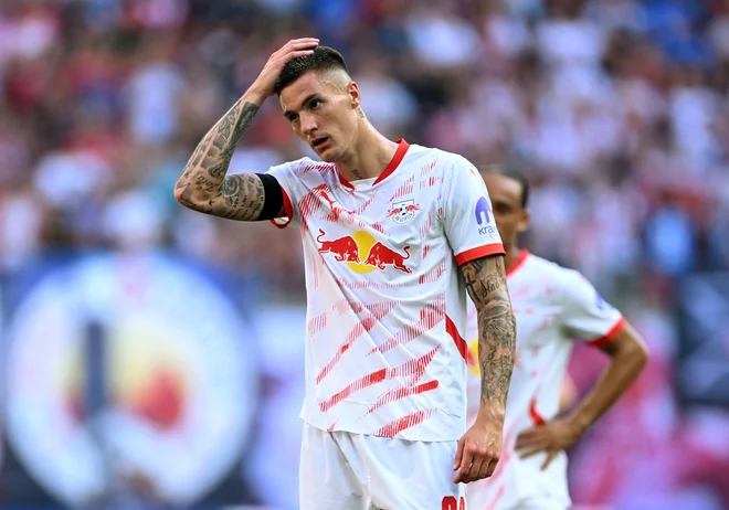 Benjamin Šeško je bil med začetniki akcije za zmagoviti gol Leipziga. FOTO: Annegret Hilse/Reuters