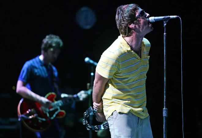 Brata Liam in Noel Gallagher sta glavna člana skupine.  FOTO: Jose Jordan/AFP