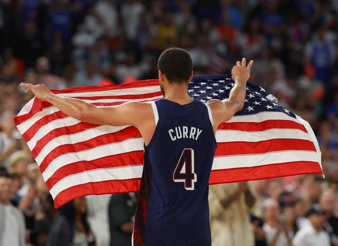 Zdaj ima Curry v svoji zbirki tudi zlato olimpijsko odličje. FOTO: Brian Snyder/Reuters
