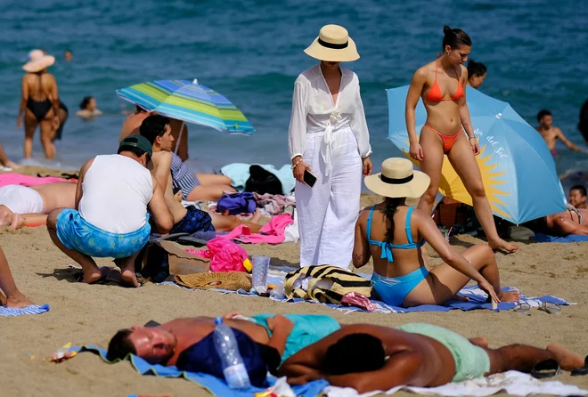 Turisti v Španiji. FOTO: Nacho Doce/Reuters