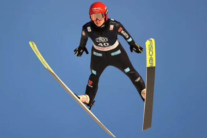 Katharina Schmid je skočila do zmage v Trondheimu. FOTO: Geir Olsen/Reuters