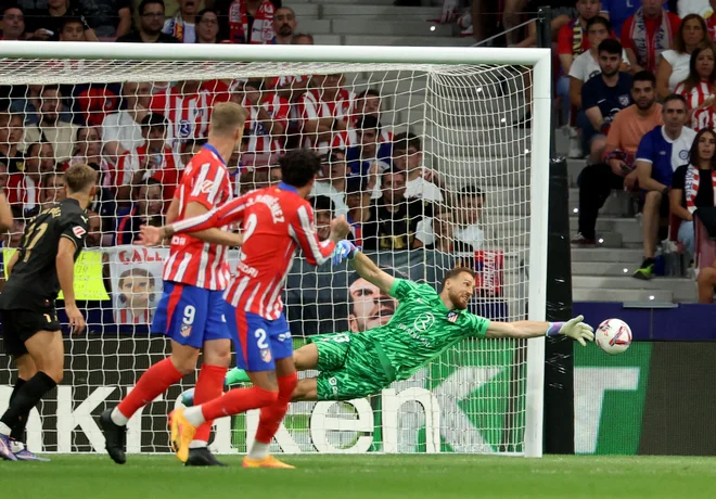 Jan Oblak je vnovič brezhibno opravil svojo nalogo. FOTO: Pierre-Philippe Marcou/AFP