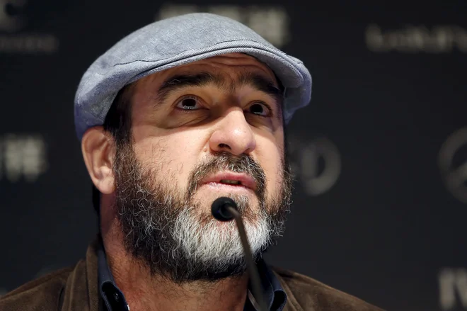 Eric Cantona je tudi nogometni komentator in igralec. FOTO: Aly Song/Reuters