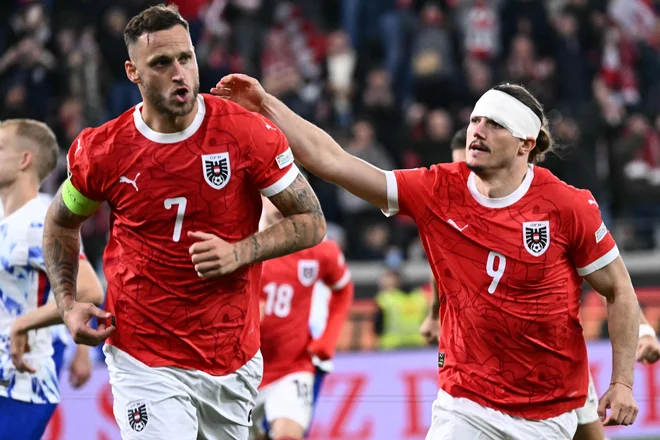 Marko Arnautović je dosegel uvodna gola za Avstrijo. FOTO: Joe Klamar/AFP