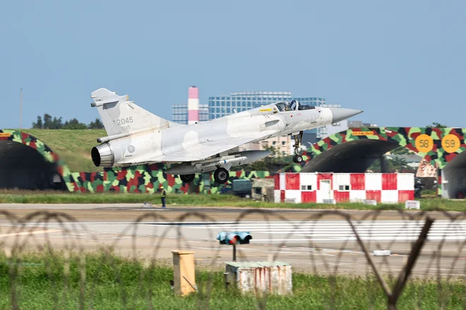 Tajvan je nove vaje označil kot provokacijo in neracionalno dejanje. FOTO: I-hwa Cheng/AFP