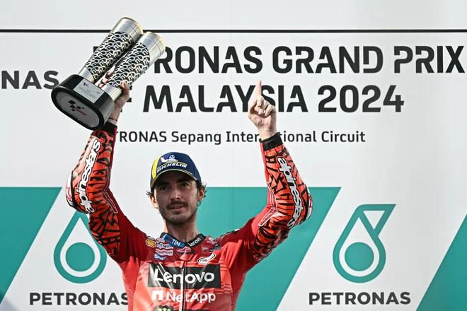 Francesco Bagnaia je na dirki moto GP za veliko nagrado Malezije prišel do desete zmage v sezoni. FOTO: Lillian Suwanrumpha/AFP