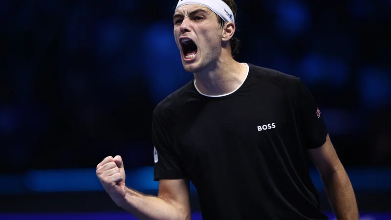 Taylor Fritz se je takole veselil zmage v polfinalu Torina. FOTO: Guglielmo Mangiapane/Reuters