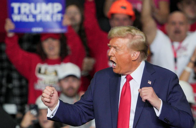 Tudi Donald Trump je že spoznal vpliv nogometne igre. FOTO: Jeenah Moon/Reuters