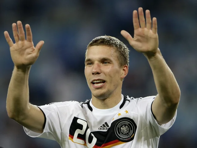 Lukas Podolski je bil med najbolj priljubljenimi nemškimi reprezentanti. FOTO: Stefan Wermuth/Reuters