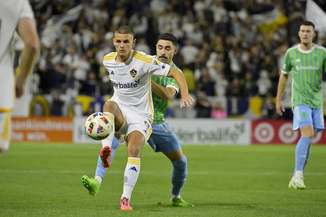 Srbskio napadalec pri moštvu LA Galaxy Dejan Joveljić je bil edini strelec za preboj v veliki finale ameriškega nogometnega prvenstva, kjer bo tekmec New York. FOTO: Jayne Kamin-oncea/Usa Today Sports Via Reuters Con