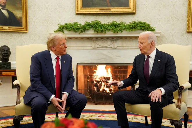 Zasluge za premirje si pripisujeta tako Trump kot Biden. FOTO: Kevin Lamarque/Reuters