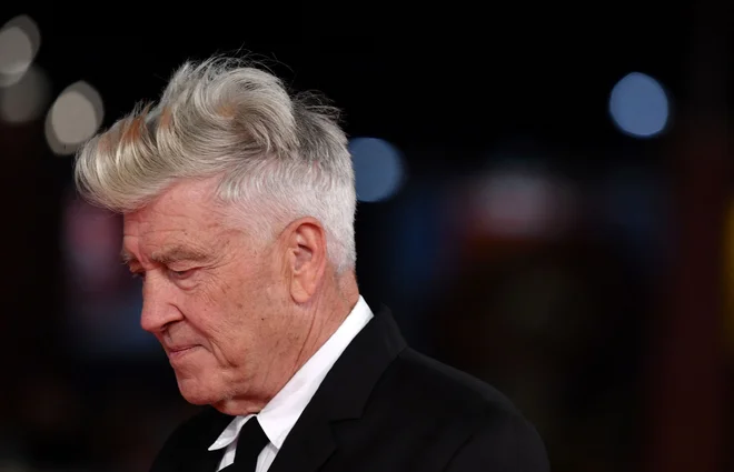 (FILES) US director David Lynch arrives at the 12th Rome Film Festival on November 4, 2017 in Rome. Lynch -- the groundbreaking director behind &quot;Mulholland Drive&quot; and television's &quot;Twin Peaks,&quot; who gained a cult following for his unsettling portraits of American life -- has died. He was 78 years old. (Photo by TIZIANA FABI / AFP)
