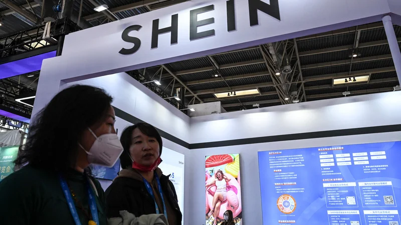 Američani – morda celo bolj kot Evropejci – obožujejo Temu, AliExpress in Shein. FOTO: Jade Gao/AFP