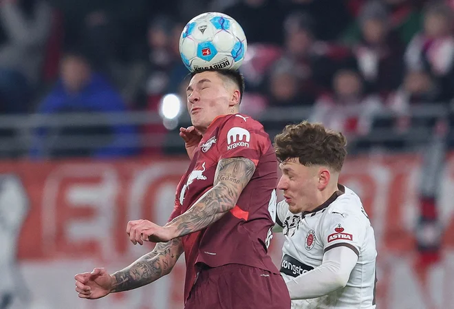 Benjamin Šeško je bil med najzaslužnejšimi za zmago Leipziga. FOTO: Ronny Hartmann/AFP