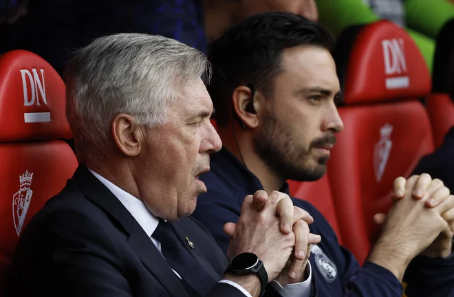 Carlo Ancelotti in njegov sin Davide izjemno uspešno sodelujeta na klopi madridskega Reala. FOTO: Vincent West/Reuters