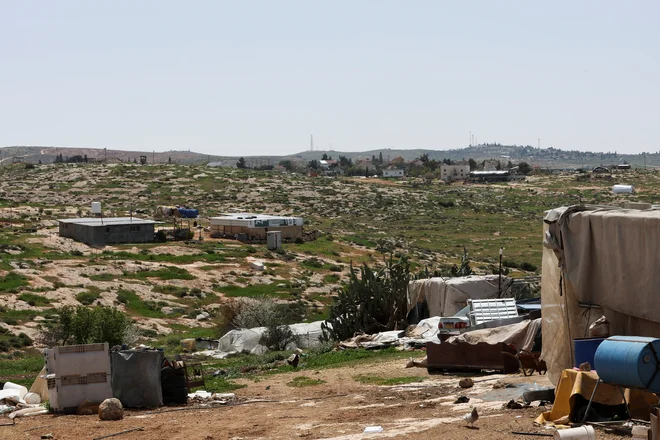 Izraelska vojaška baza v Susiji na okupiranem Zahodnem bregu. FOTO: Mussa Issa Qawasma/Reuters