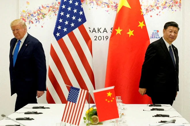 Donald Trump in kitajski predsednik Xi Jinping FOTO: Kevin Lamarque/Reuters