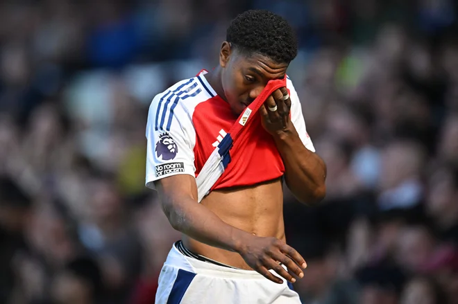 Myles Lewis-Skelly je bil razočaran v Liverpoolu, Arsenal ni zmagal, sam je zakrivil enajstmetrovko. FOTO: Andy Buchanan/AFP