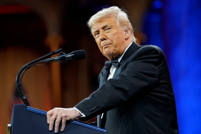 Trump je včeraj zvečer v svojem slogu nagovoril kongres. FOTO: Nathan Howard/Reuters