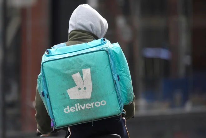 Britansko podjetje Deliveroo bo verjetno pojedel ameriški Doordash. Foto Toby Melville/Reuters