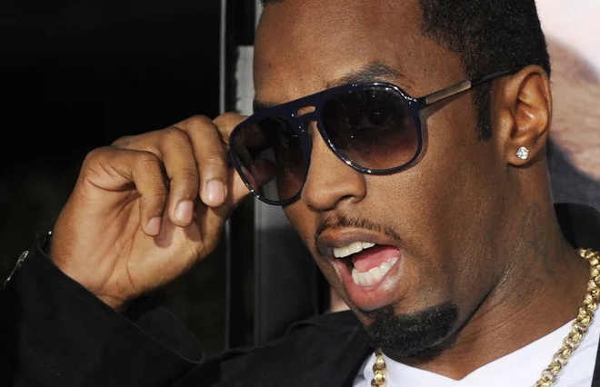 Sean John Combs se je rodil 4. novembra 1969 v Harlemu in je leta 1990 kot pripravnik vstopil v glasbeno industrijo pri založbi Uptown Records, kjer je sčasoma postal vodja oddelka za nove glasbenike. FOTO: Mark Ralston/AFP