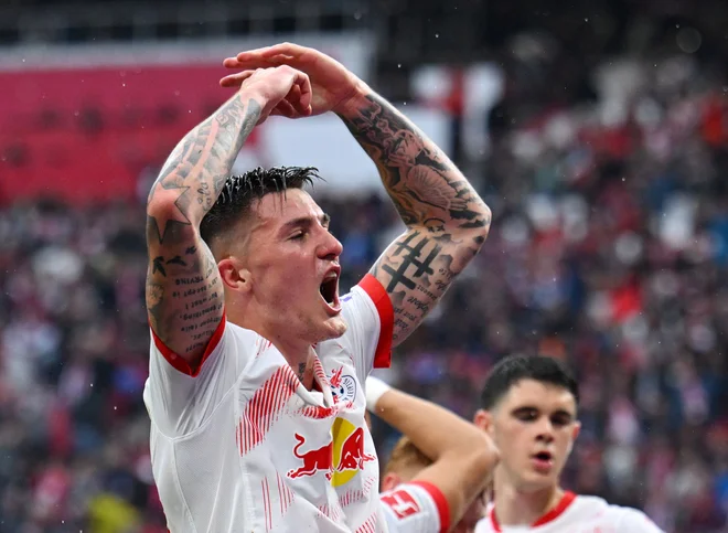 Benjamin Šeško je v sezoni dosegel 21 golov. FOTO: Annegret Hilse/Reuters