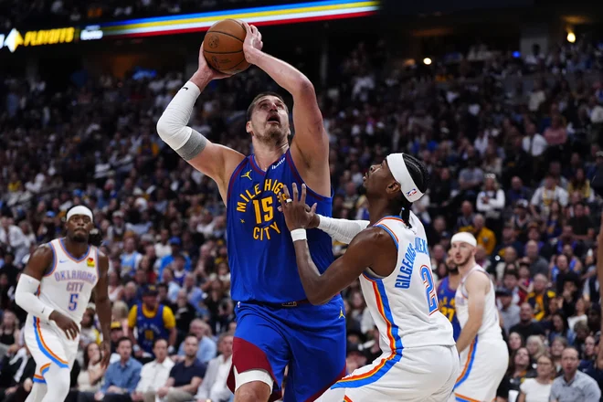 Nikola Jokić ni imel dobrega meta, a Denver se je vseeno veselil zmage. FOTO: Ron Chenoy/Reuters