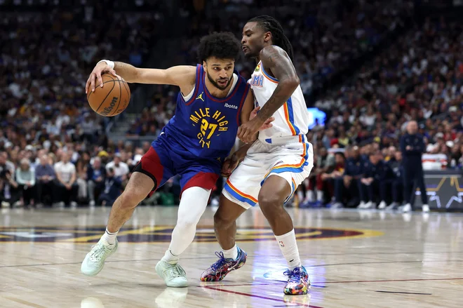 Jamal Murray je bil najbolj učinkovit pri Denverju. FOTO: Matthew Stockman/AFP