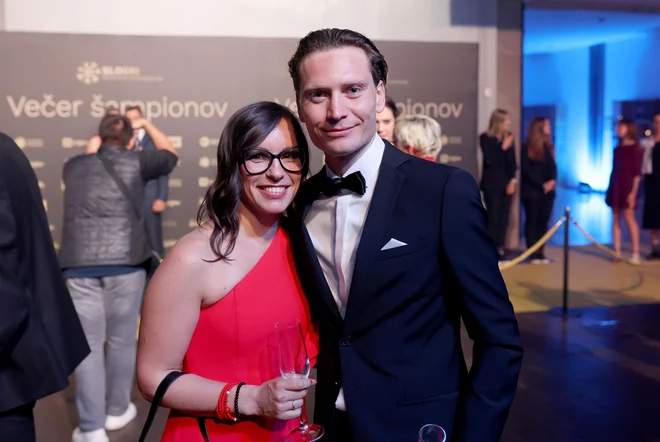 Nika and Domen Prevc glowing in the headlights of the headlights