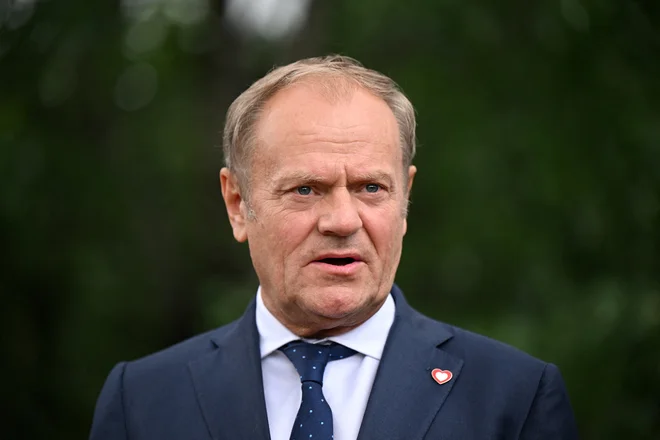 Premier Tusk je namreč že aprila opozarjal na podobno resen kibernetski napad na informacijske sisteme svoje stranke. FOTO: Leon Neal/Reuters