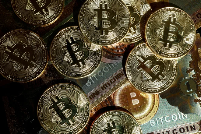 Bitcoin zdaj ni več eksperiment, ampak za mnoge digitalni naslednik zlata. FOTO: Benoit Tessier/Reuters