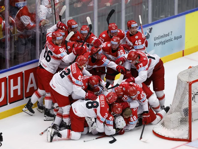 Danski hokejisti so se prešerno veselili preboja v četrtfnale svetovnega prvenstva. FOTO: David W Cerny/Reuters