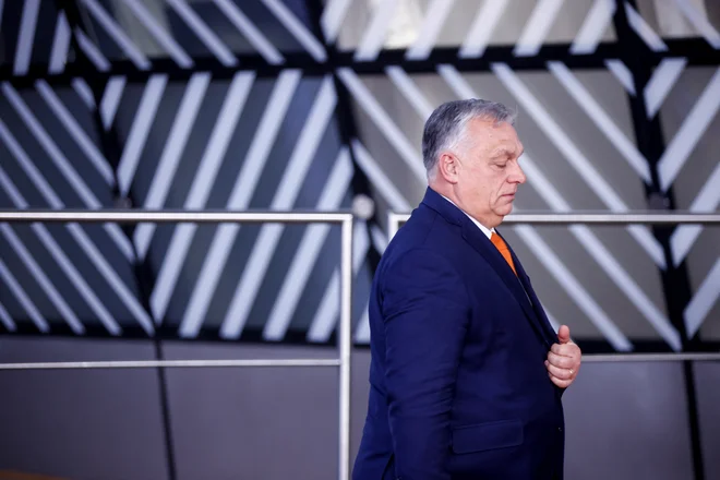Madžarski premier Viktor Orbán je večkrat blokiral ali zavlačeval svežnje pomoči EU Ukrajini in nasprotoval sankcijam proti Rusiji, kar je že večkrat sprožilo grožnje z odvzemom glasovalnih pravic Budimpešti. FOTO: Johanna Geron/Reuters