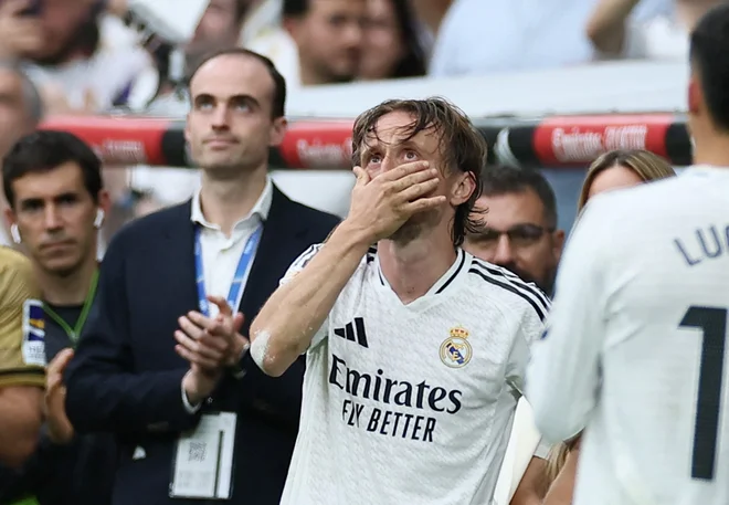 Luka Modrić je bil močno ganjen. FOTO: Isabel Infantes/Reuters