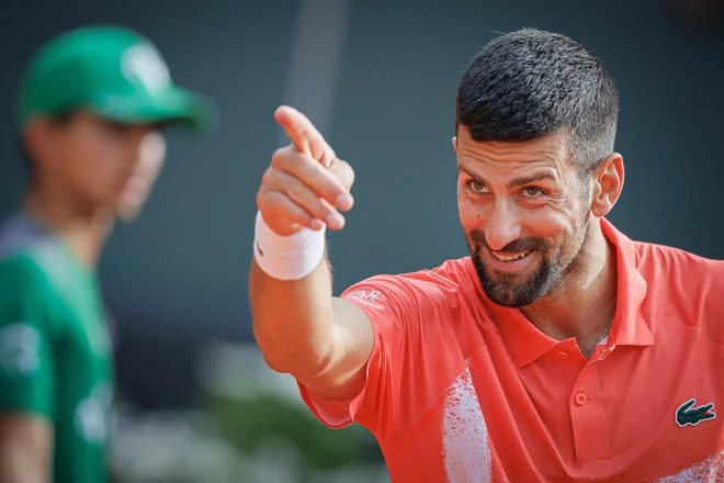 Srbski teniški as Novak Đoković je zmagal na stotem turnirju v svoji karieri. FOTO: Valentin Flauraud/AFP